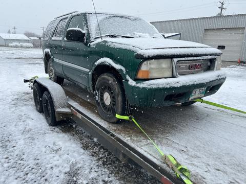 Cash ForCars | GMC SUV on Trailer for Junk Car Removal