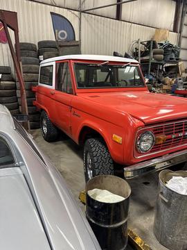 Cash ForCars | 1970s Ford Bronco in Garage for Scrap Metal Recycling