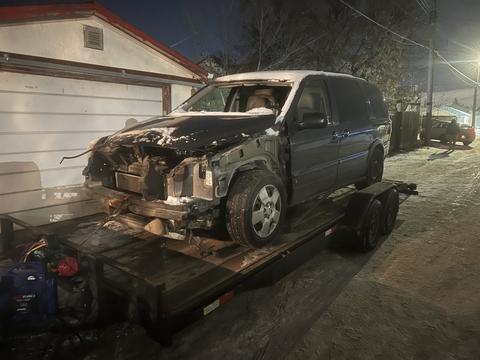 Cash ForCars | Scrap Minivan on Trailer for Junk Car Removal