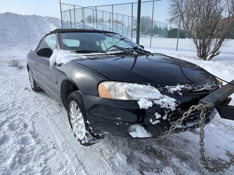 Cash ForCars | Scrap Car Removal of a Black Chrysler Sebring Convertible